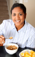 Woman eating cereal