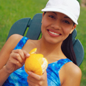 Woman eating an orange